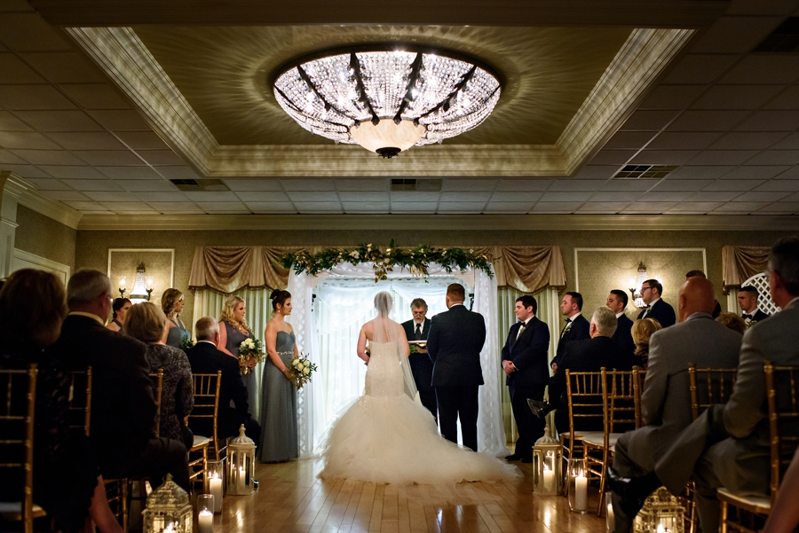 A bride and groom at the alter at northampton valley country club.